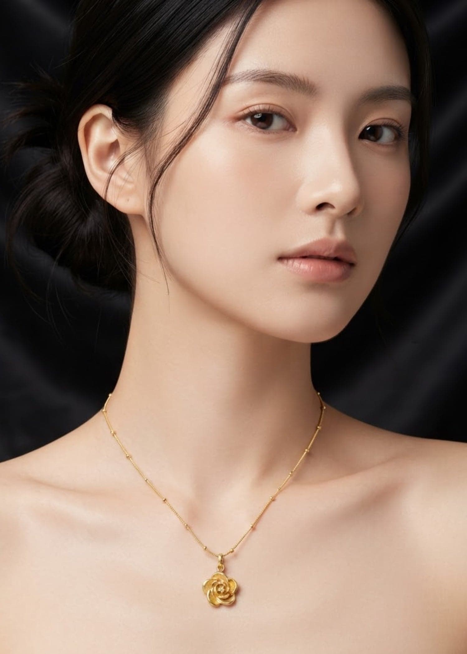 Gold floral pendant