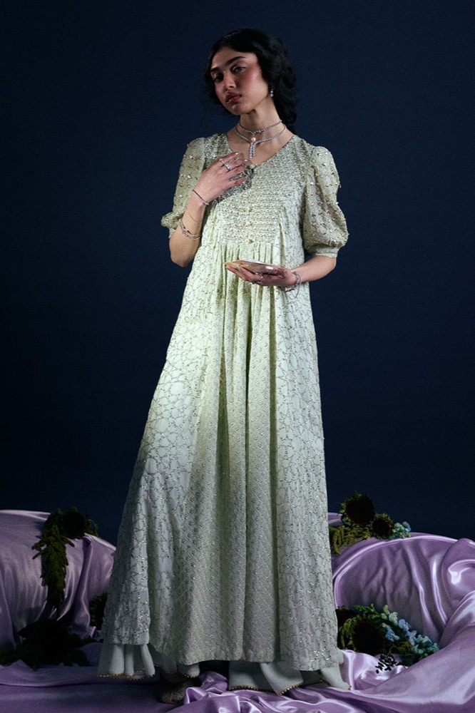 Soft green full-length gharara ensemble with all-over fine work