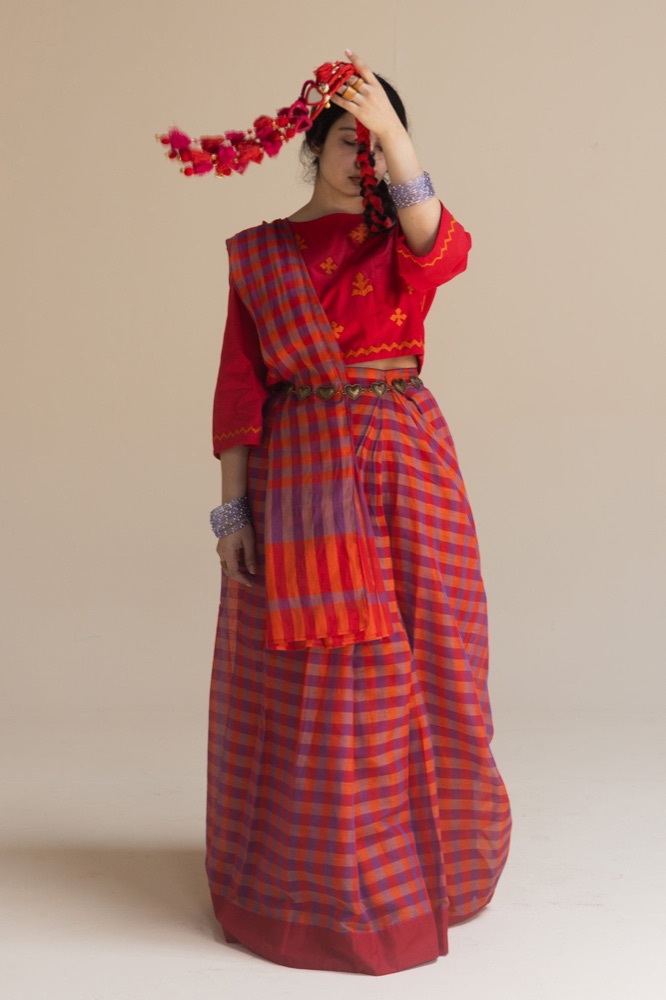 Ruby red handwoven saree with a striped weave and red blouse
